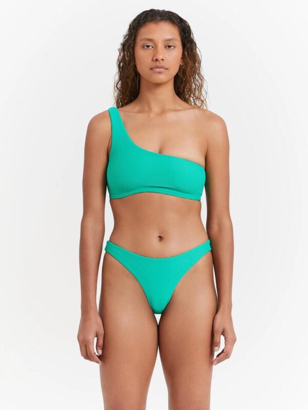 Beyond Her Asymmetrical Top